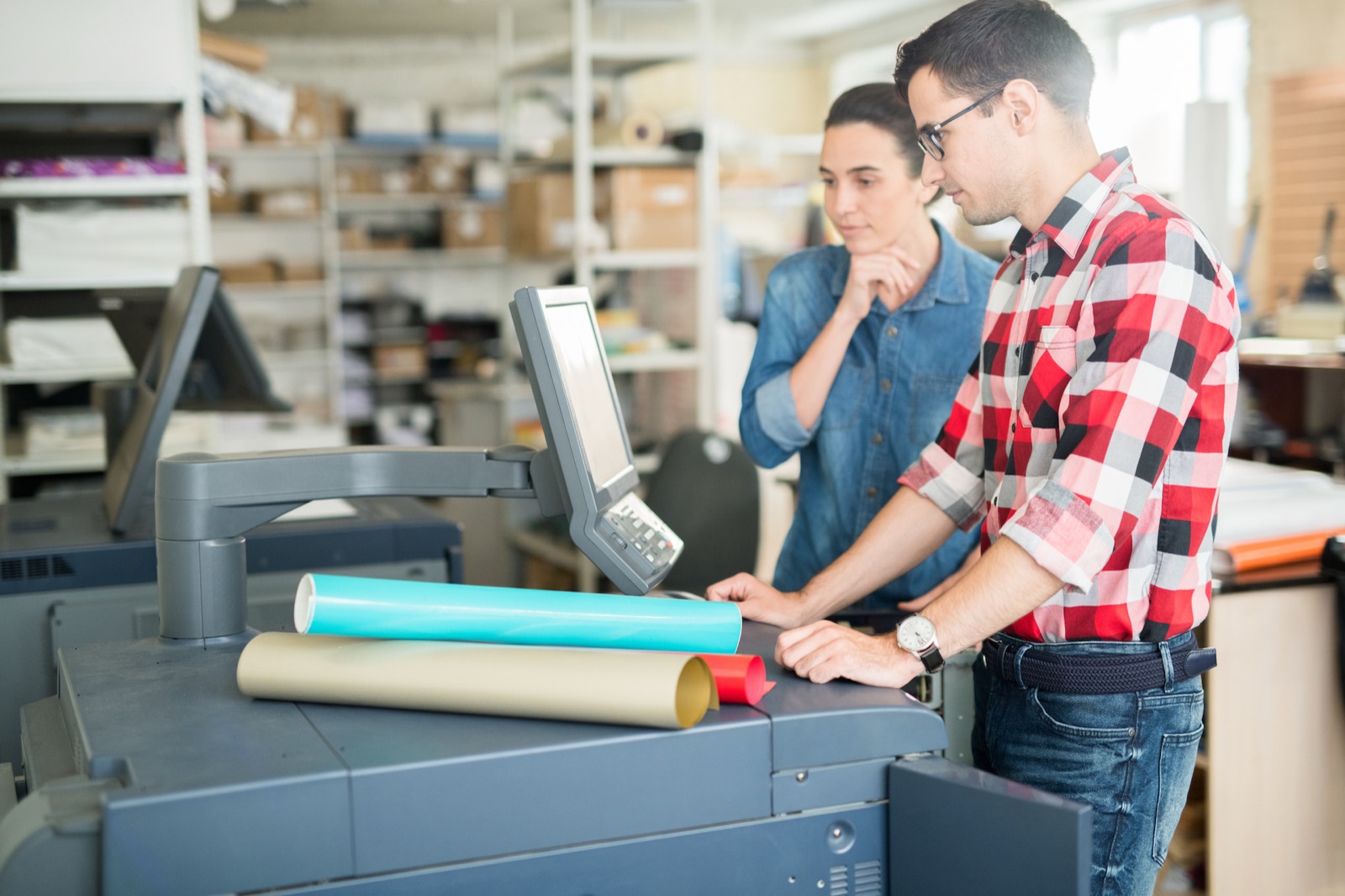 Team using a multifunction office printer